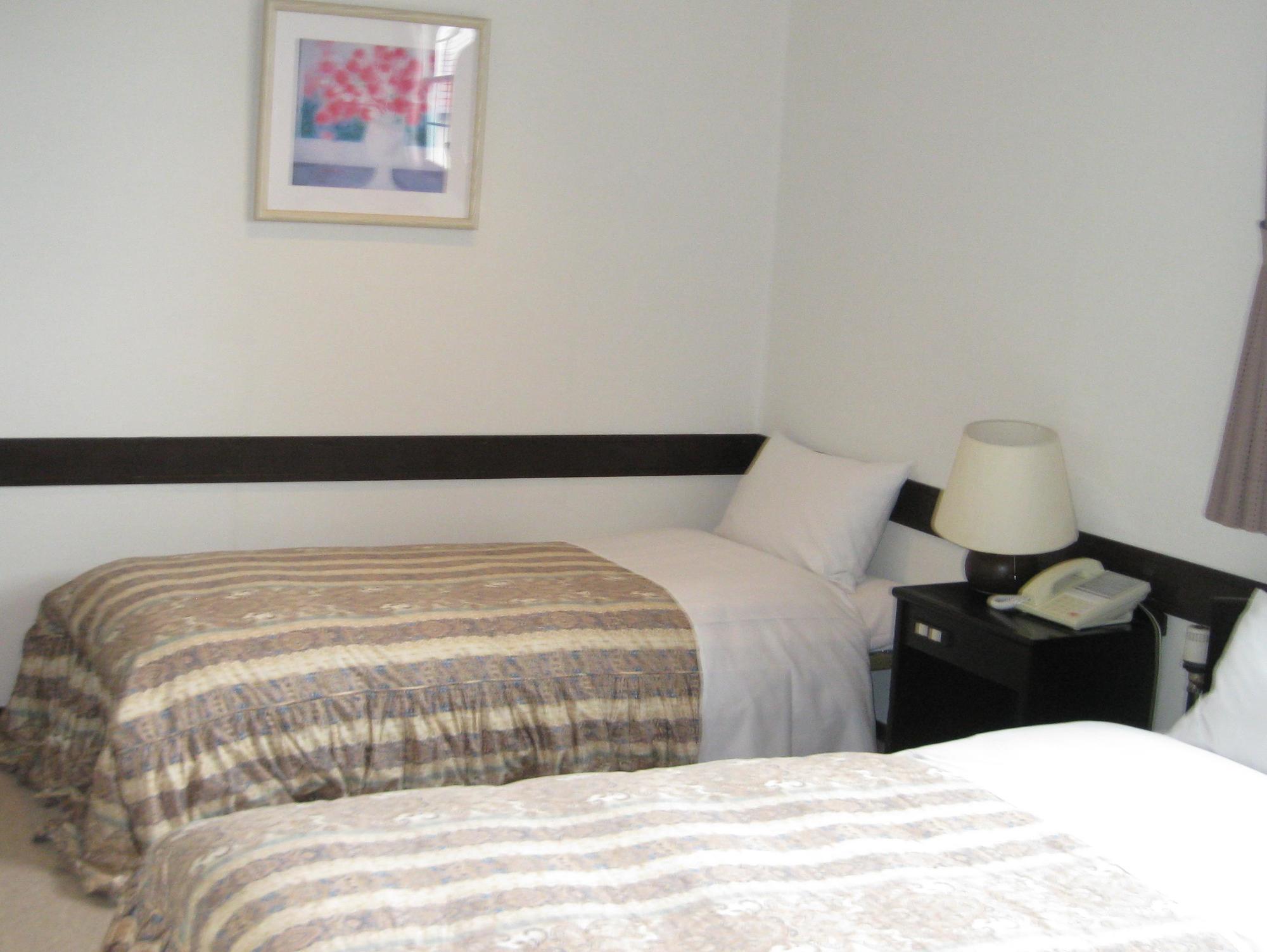 Petit Hotel Kanan Тіно Екстер'єр фото
